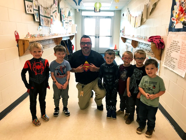 Mr. Richards hangin' out with some of our district's superheroes!!